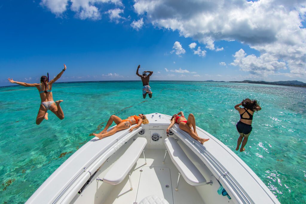 Jumping off the bow and sunbathing